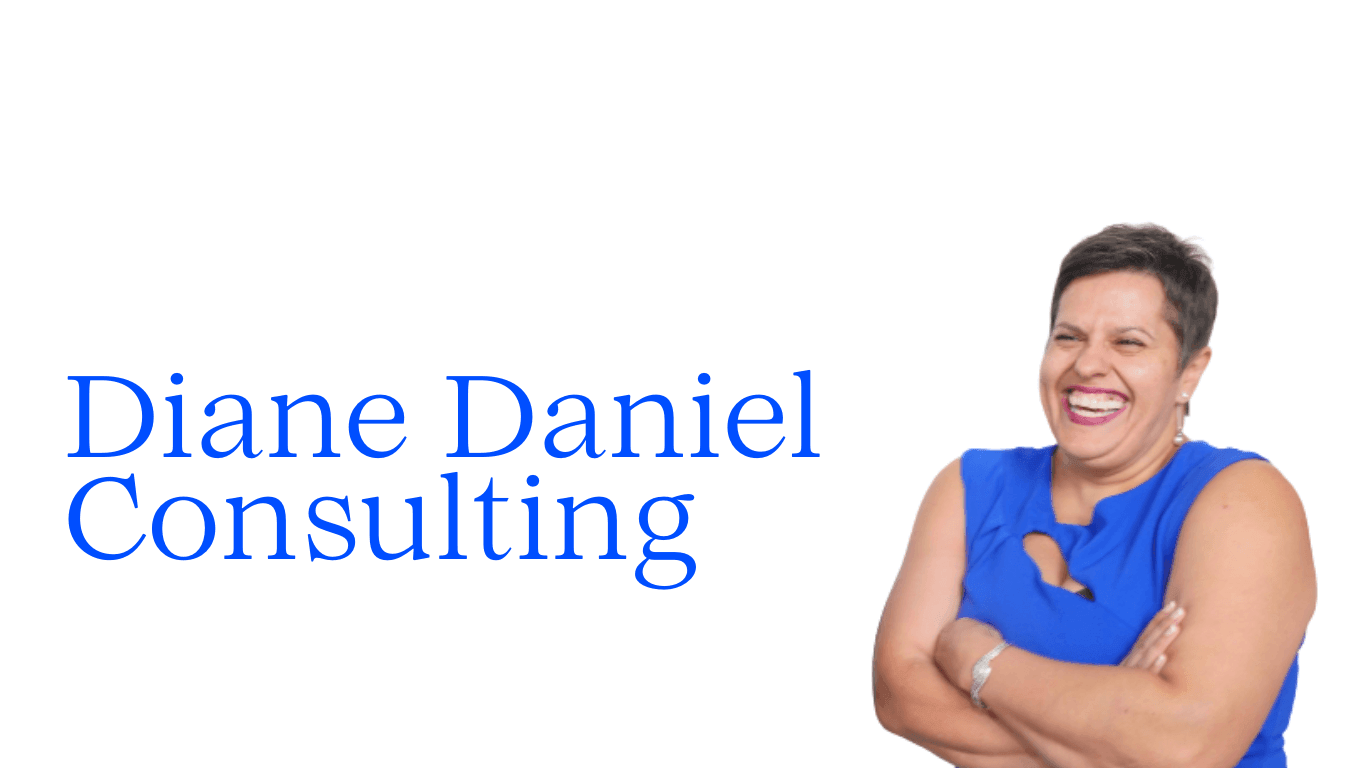 Woman in a sleeveless blue dress smiling with arms crossed next to the text Diane Daniel Consulting.